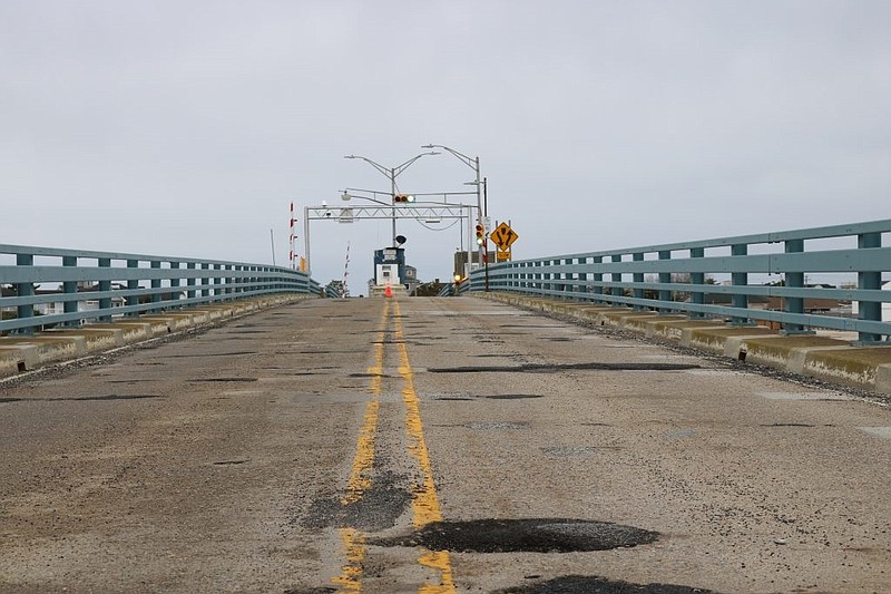 A refurbishing of the bridge's deteriorated concrete deck will fix the potholes.