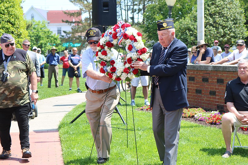 Veterans Fred Distell and George Meyers perform the presentation of the wreath at the Memorial Day service in 2022.