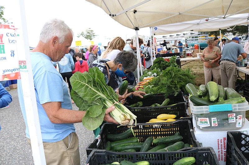 Shoppers pick up deals and lots and lots of fruits and veggies at the Ocean City Farmers Market.