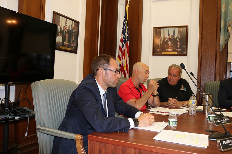 Councilman Jody Levchuk, in red shirt, wants to prevent rowdy teens from damaging Ocean City's family-friendly reputation.