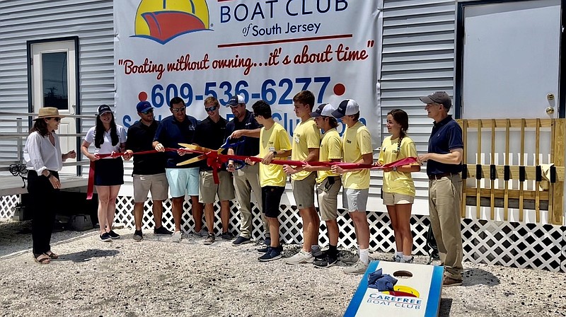 Carefree Boat Club officials cut the ceremonial ribbon for the new location at the All Seasons Marina in Marmora.