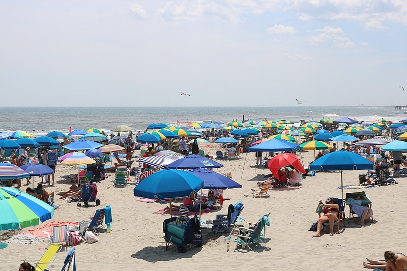 Visitors pack Ocean City beaches.