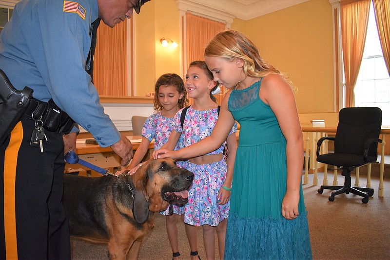 Cape May County Sheriff's Officer Jose Gomez lets Sgt. Ryan Clary's daughters, Jersey and Clover, and niece, Harper, pet West the K-9. (Photos courtesy of Cape May County)