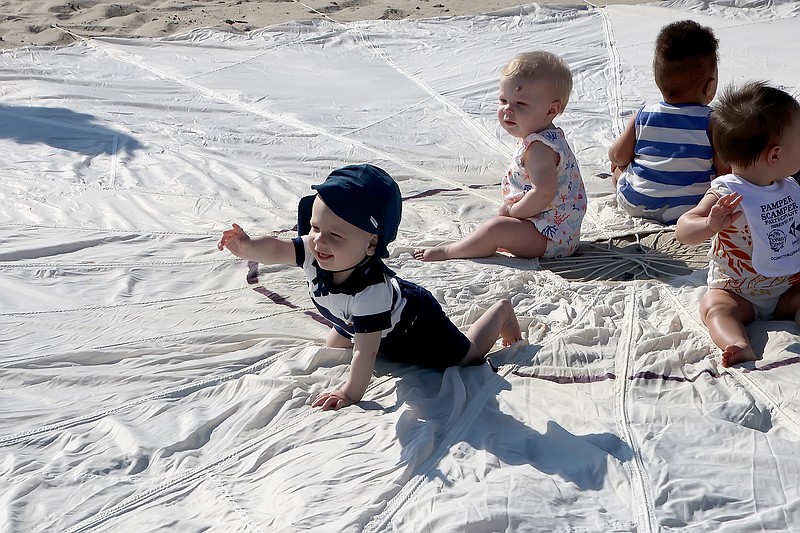 The baby crawling race is an annual precursor to the Baby Parade. 