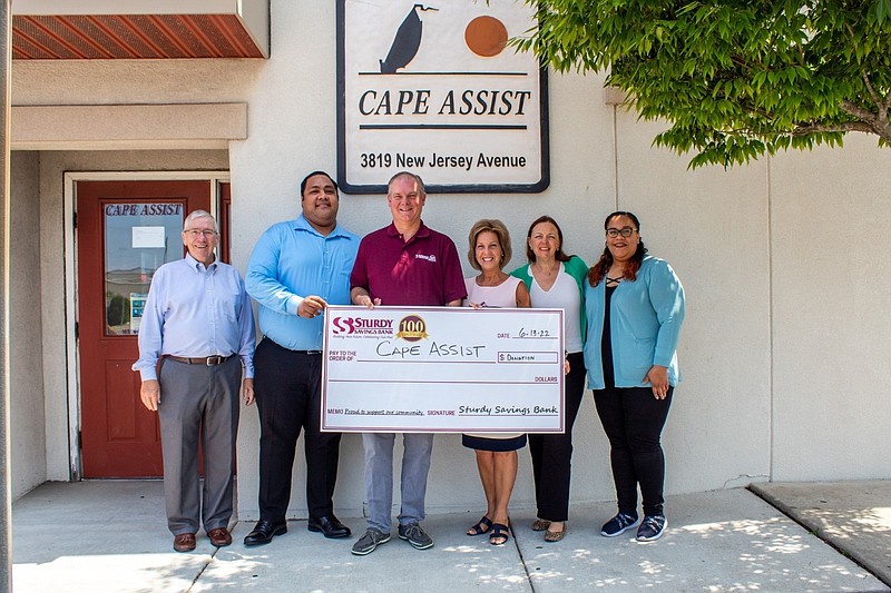 Sturdy Savings Bank presents Cape Assist with a $5,000 donation to support their 8th Annual Summer Benefit this September.  (Photo courtesy Laura Bishop Communications)