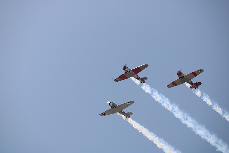 The Jersey Jerks team flies three vintage T-6s in close formation in a display of precision flying.