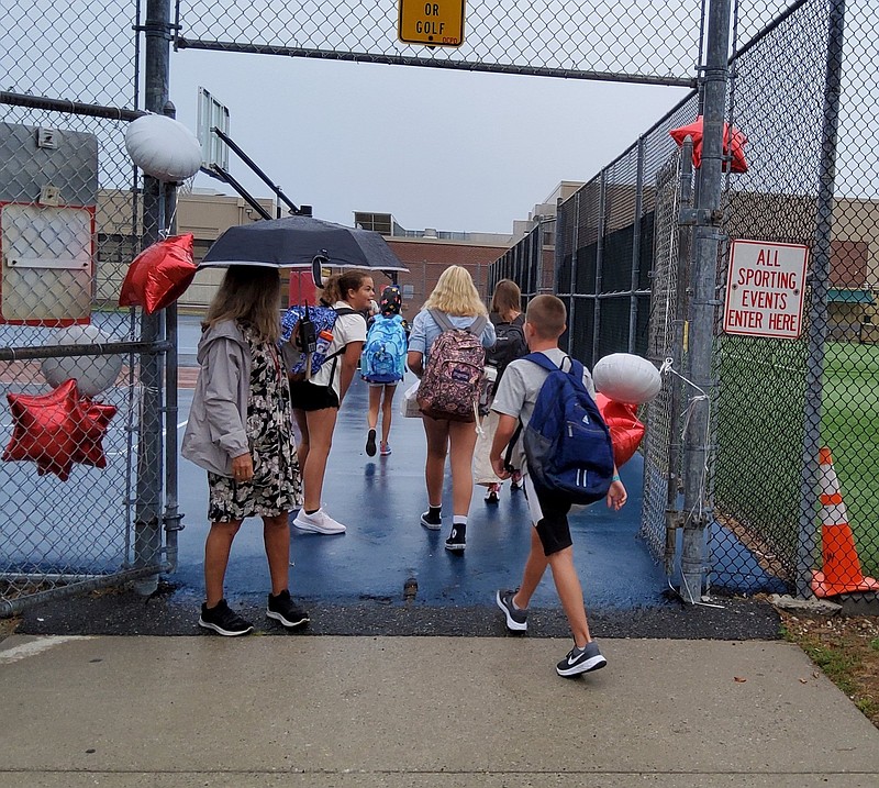 Intermediate School students are greeted by welcoming balloons in school colors of red and white. (Photo courtesy of OCIS Facebook page)