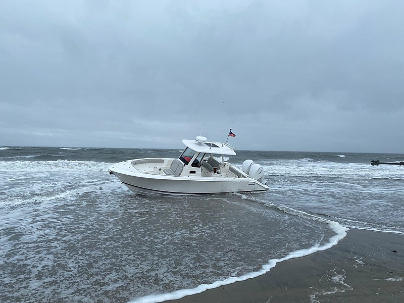 As of Tuesday afternoon, the boat on North Street beach was awaiting towing services. (Photo courtesy of Ocean City)