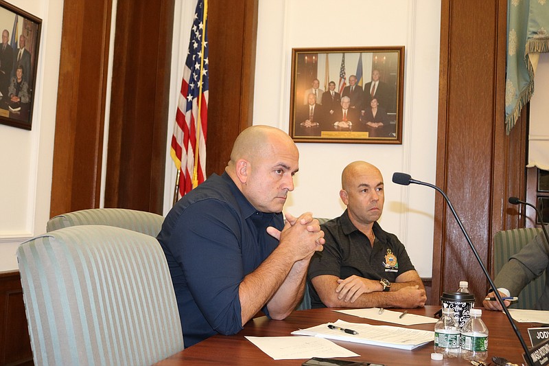 Councilman Tom Rotondi, left, seated next to Councilman Jody Levchuk, will hold the meeting.