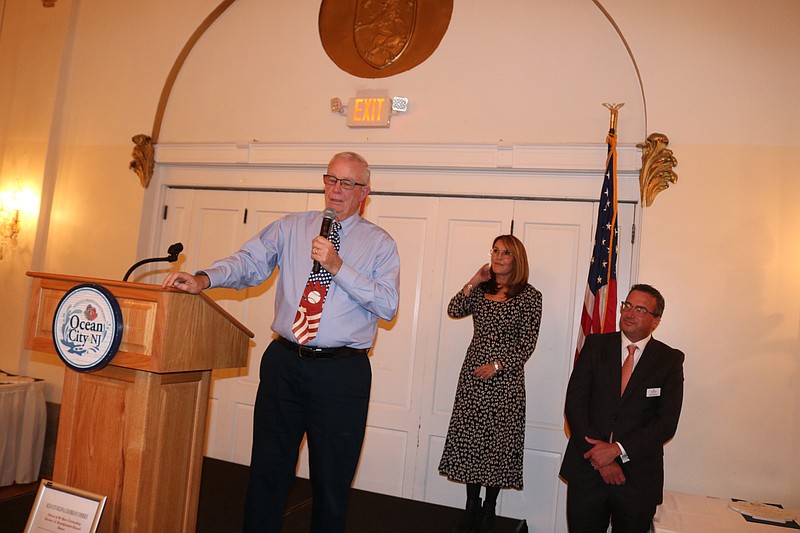 Greg Donahue speaks to the audience during the ceremony at the Flanders Hotel.