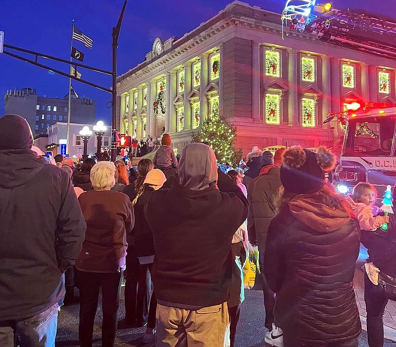 Crowds gaze at the illuminated City Hall. (Photo courtesy of the Ocean City Regional Chamber of Commerce)