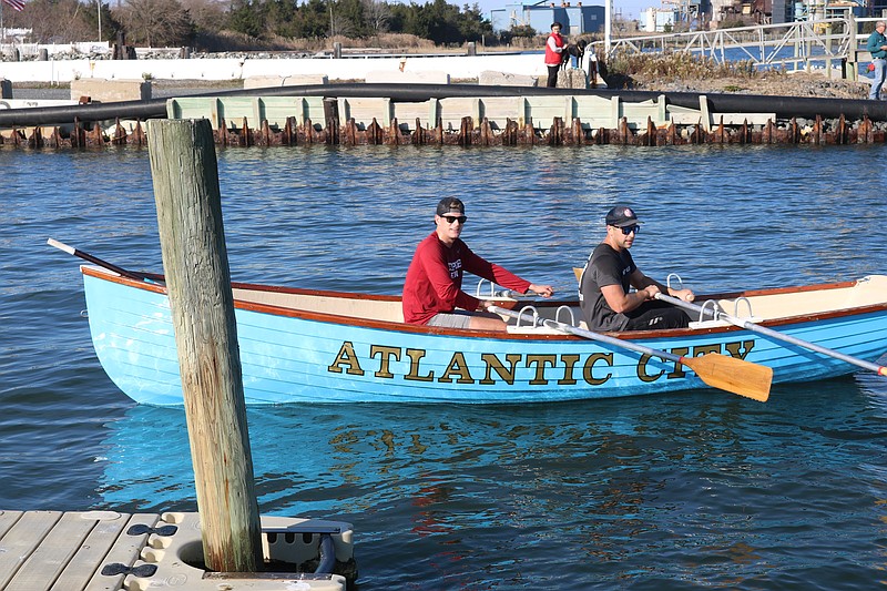 Overall winners Vince Granese and Nicholas Guidara, of the Atlantic City Beach Patrol, finish the race.