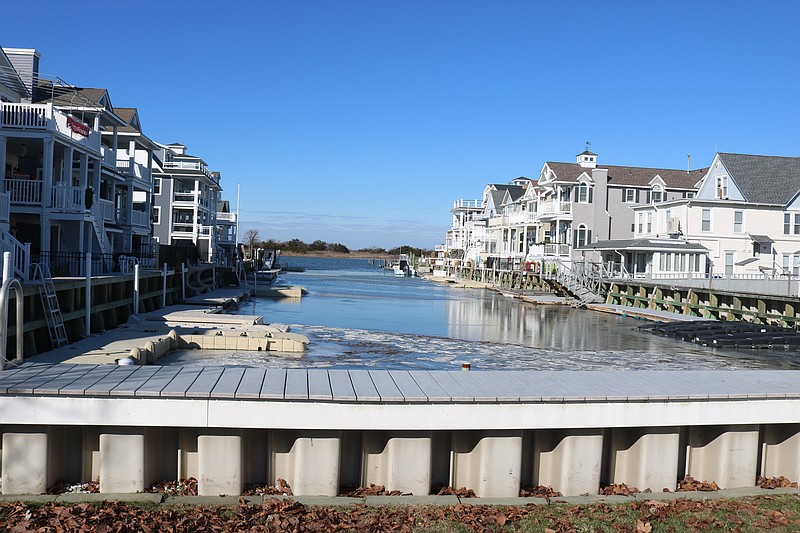 The city’s narrow lagoons overlooking the back bays, like this one off Bay Avenue near 10th Street, often need to be dredged to remove a buildup of sediment. 