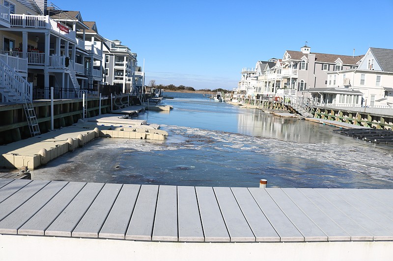 The city’s narrow lagoons overlooking the back bays, like this one off Bay Avenue near 10th Street, often need to be dredged to remove a buildup of sediment. 