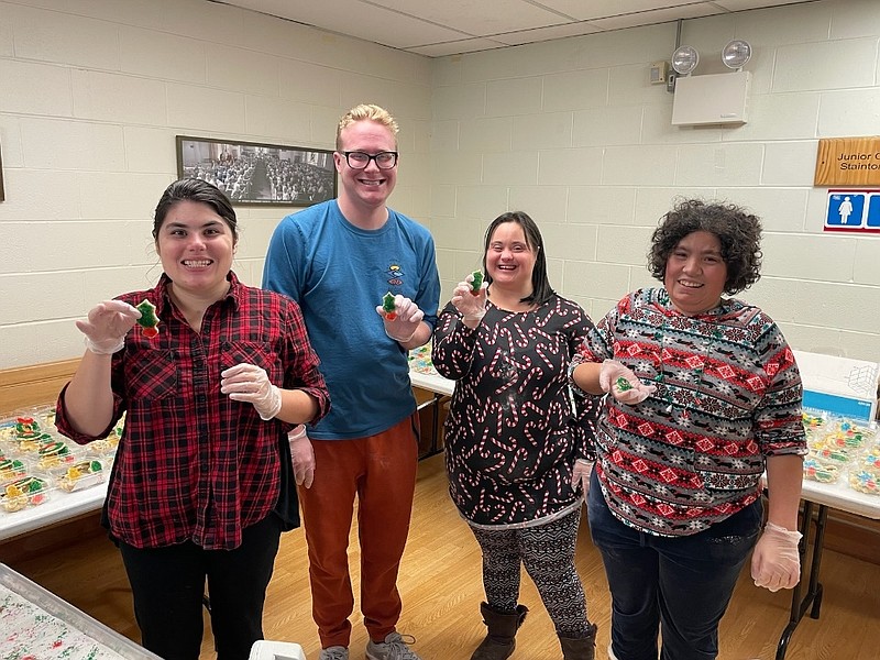 From left, Heritage Homestead volunteers Georgie, Ryan, Marisa and Victoria display their cookie confections. (Photo courtesy of Jen Bowman)