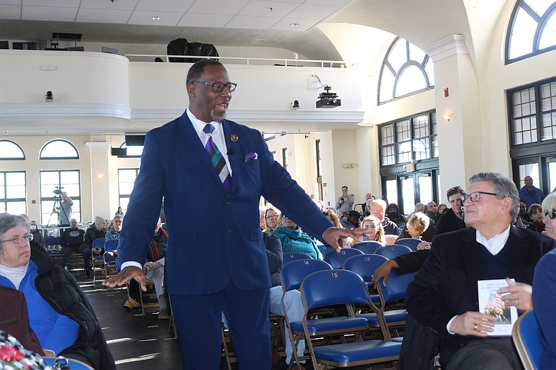 Rev. Gregory Johnson greets audience members on his way to the stage to recite Dr. Martin Luther King's "I have a Dream" speech during Ocean City's ceremony in 2023.