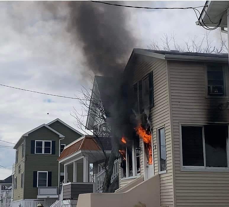 Flames erupt from the home at 932 Simpson Ave. (Photo courtesy of OCNJ Chatter Facebook page)