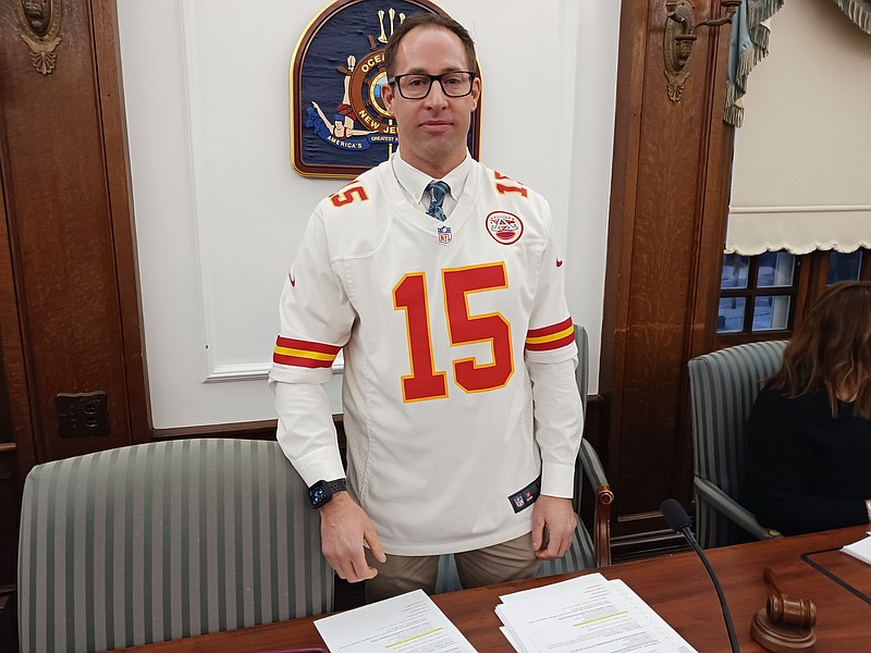 Pete Madden is looking "Super" in a Chiefs jersey after losing a bet to fellow Councilman Bob Barr.