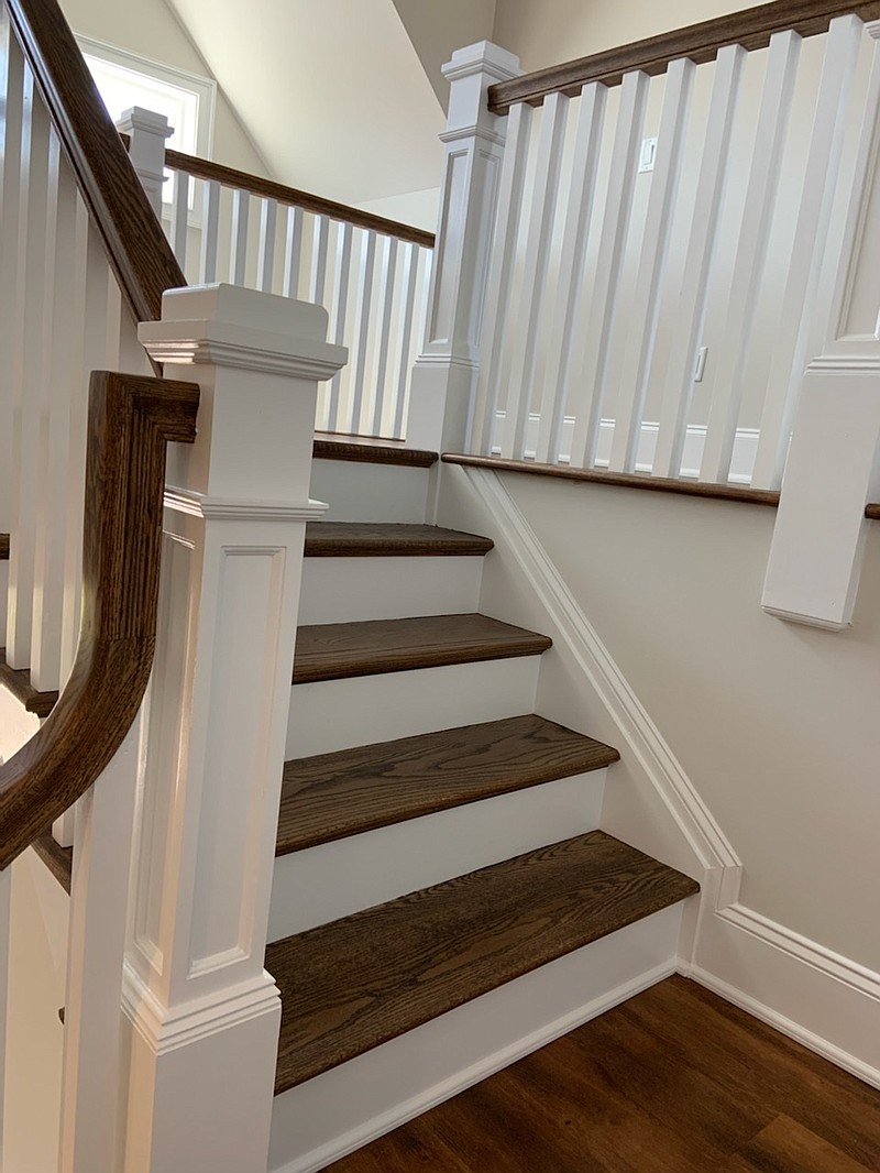 A freshly painted stairwell at a home of a recent job. (Photo courtesy of DSD Painting LLC)