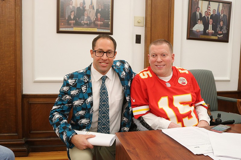 City Council President Pete Madden wears Eagles attire, while Councilman Bob Barr shows his love for the Chiefs before the Super Bowl.