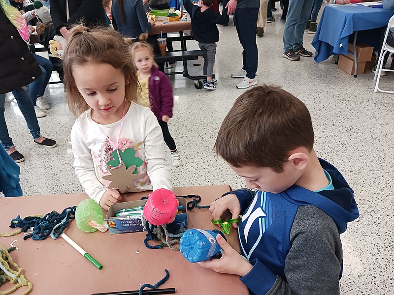 Mia Tridente, 4, of Ocean City, and brother, C.J., 6, enjoy making art out of recycled products.