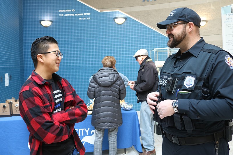 Officer Jack Davis speaks with Ocean City High School student Rob Malfitano during a Coffee With Cops event in 2023.