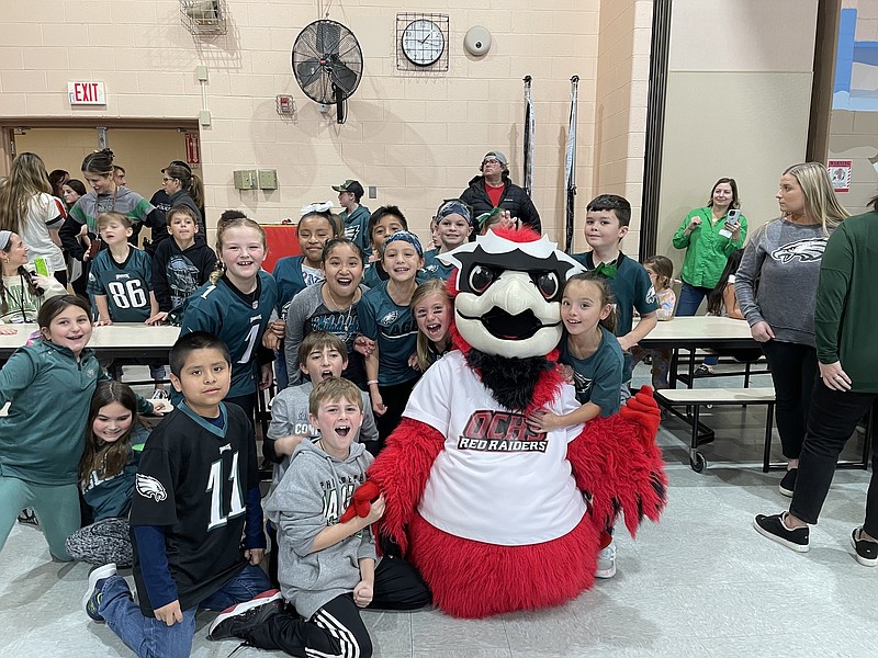 The primary school holds a pep rally and also participates in a coin toss fundraiser. (Photo courtesy of JASM Consulting)