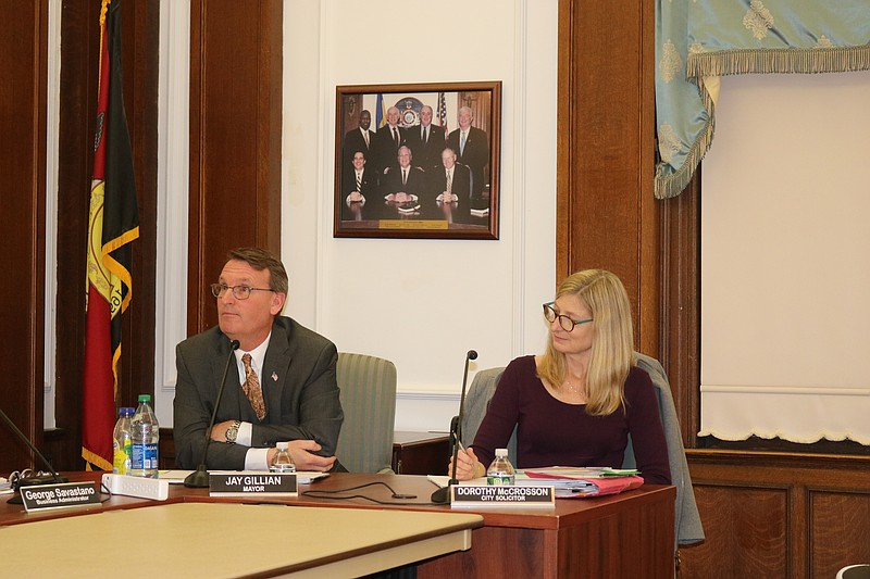 Mayor Jay Gillian, seated next to City Solicitor Dorothy McCrosson, is sending a strong message.