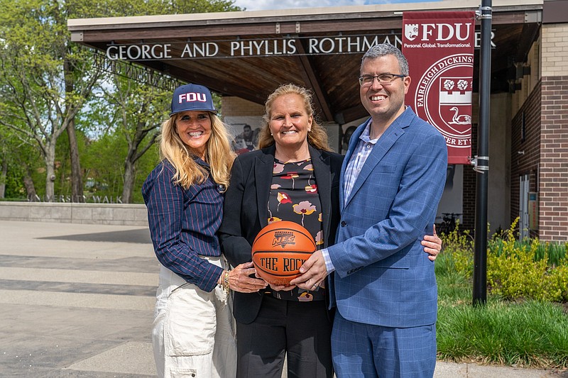 Stephanie Gaitley, the new Fairleigh Dickinson University women's basketball coach, center, with her sister, Coco Lefkowitz, and Interim FDU President Michael Avaltroni. (Photo provided by the Gaitley family)