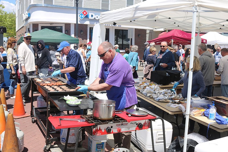 There is plenty to eat at the block party including these burgers and hot dogs thanks to the Ocean City Exchange Club.