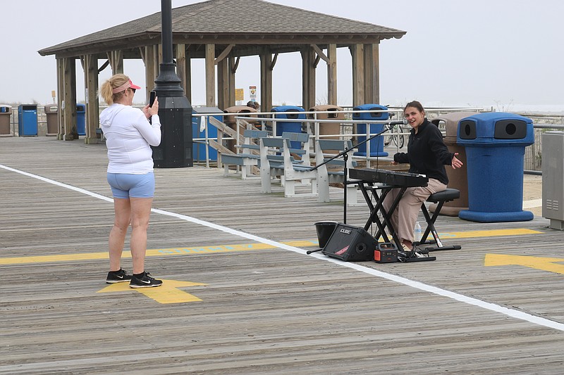 A keyboard player entertains Boardwalk visitors in April.