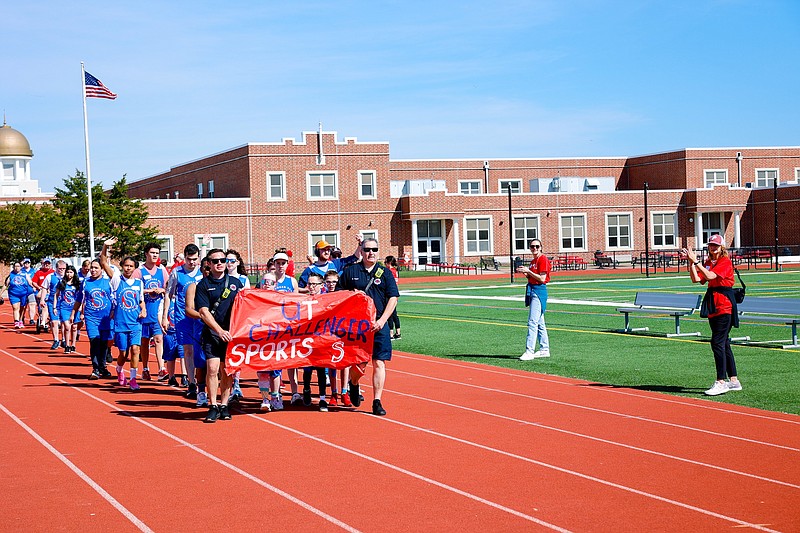 The parade of athletes. (Photo courtesy of Kerri J Photography)