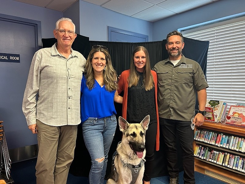 From left, Jim Nestor, Jennie Hill with her Wounded Blue Foundation device dog, Barren, Ocean City Beach Patrol Lt. Holly Lesser and Bill Mazur, after a training session in the weeklong program for first responders sponsored by OCBP. (Photo courtesy of OCBP) 