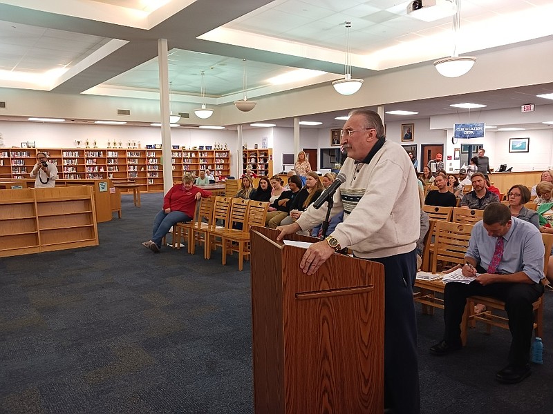 Vic Staniec speaks at a school board meeting earlier this summer about the former superintendent.