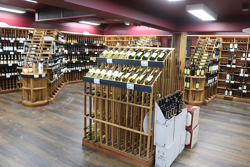 The refrigerated walk-in wine cellar has a capacity of 10,000 bottles of wine and champagne.