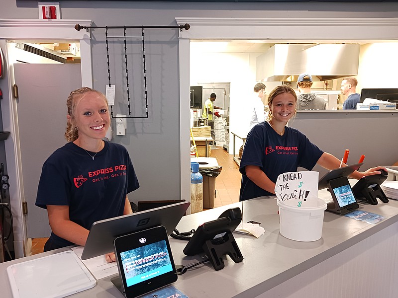 Ava Rue, an Ocean City High School student, left, and Sarah Zamrowski, an Ocean City summer resident, work the counter.