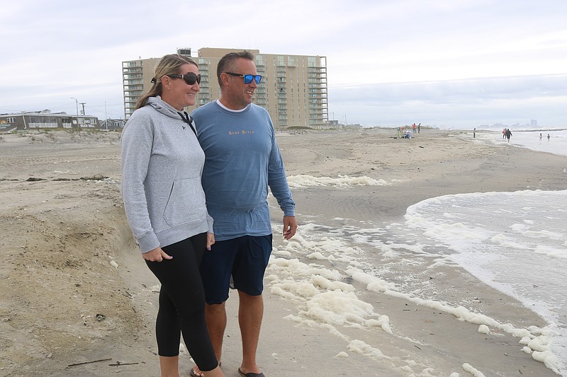 Trish and Jeff Morgan survey the erosion.