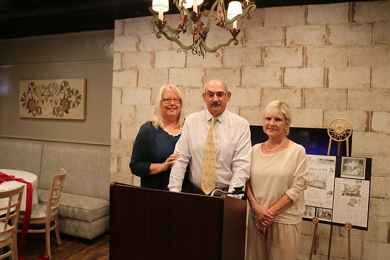 From left, Arlene and Peter Voudouris and Kim Maguire reflect on the hotel's turbulent history and recovery.