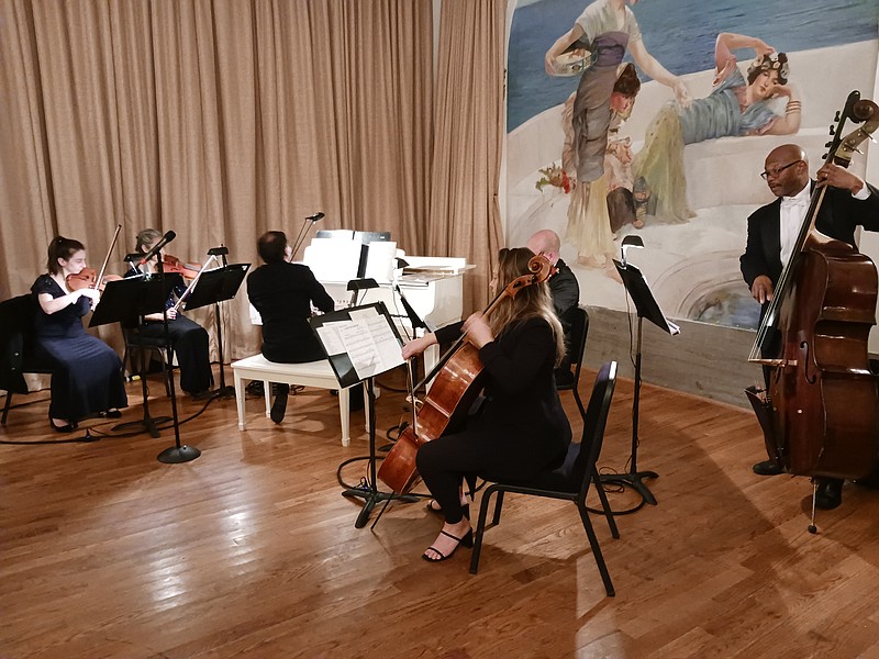 Members of the Ocean City Pops orchestra perform the classics.