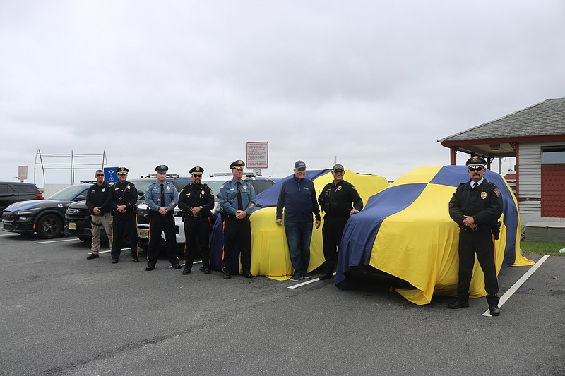 Police officers from area departments join for the ceremony.