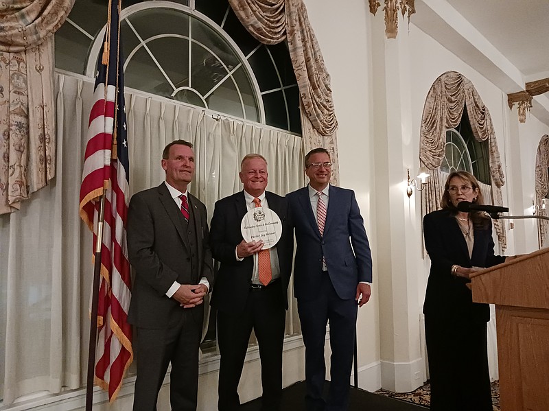 Pastor Jay Reimer accepts an award on behalf of the Ocean City Tabernacle.