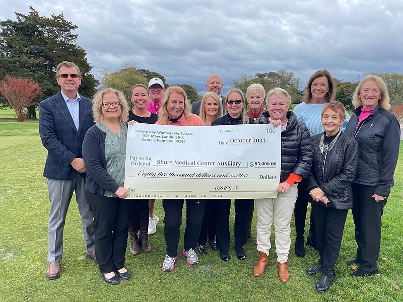 Swing Tournament check presentation. (Photo courtesy of Shore Medical Center)