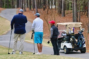 https://unsplash.com/photos/3-men-in-white-uniform-riding-golf-cart-during-daytime-Cmezsi2G8q8