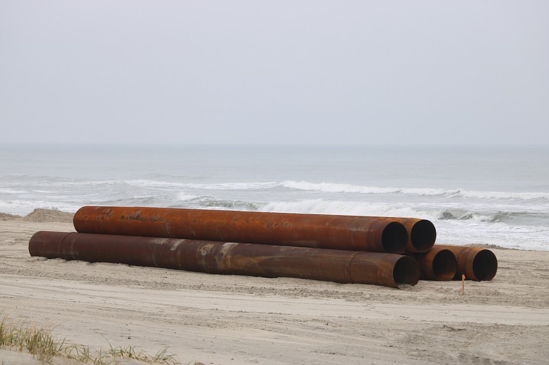 Some of the massive pipes used for the beachfill project will be removed.