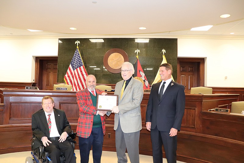 Cape May County Commissioner Jeffrey Pierson, second from right, is recognized for his years of public service. (Photo courtesy of Cape May County)