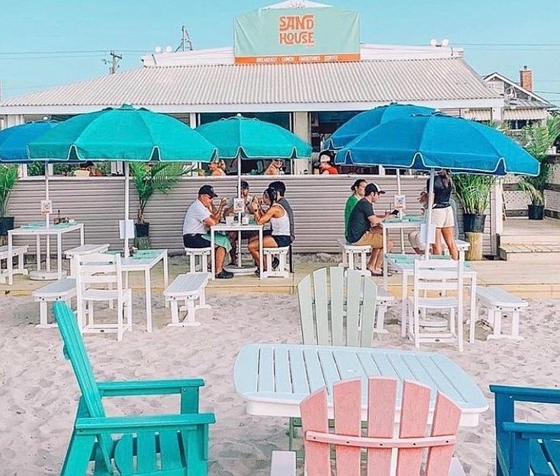 The Sand House Kitchen offers a laid back place to dine right on the beach.