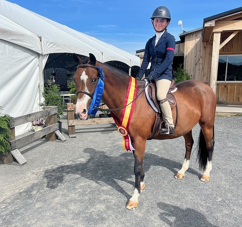 Regan Capone and her horse, Tia Maria, win ribbons at a show in Saugerties, N.Y., in 2023. (Photos provided by the Capone family)