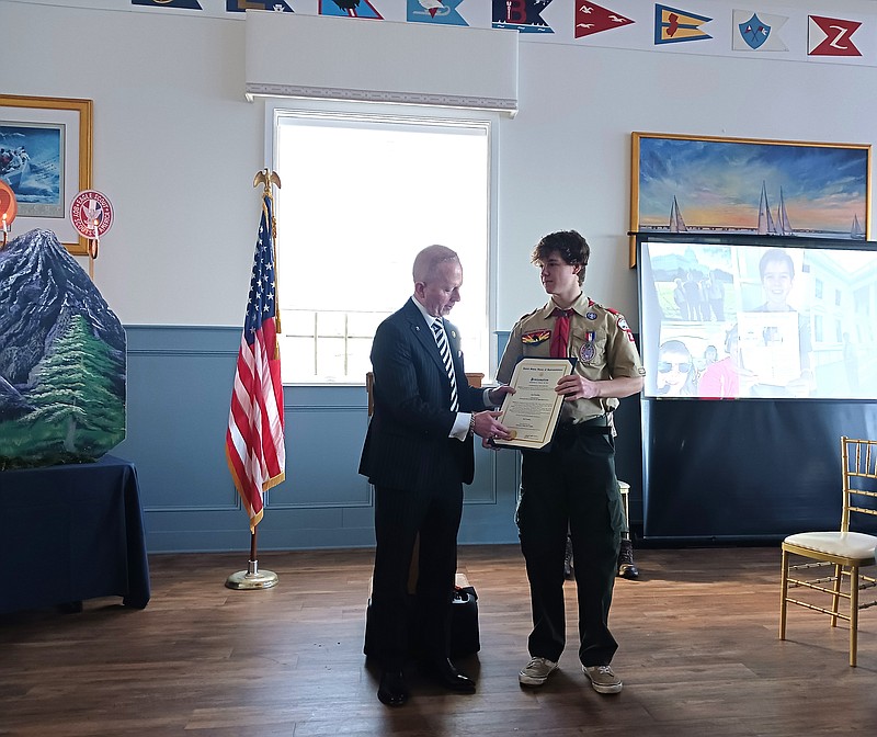 Congressman Jeff Van Drew presents Ian with a proclamation.