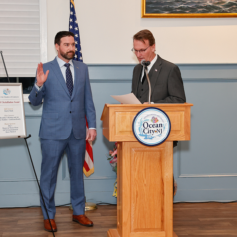  Mayor Jay Gillian swears in Patrick McMahon as the new president of the Ocean City Regional Chamber of Commerce. (Photos courtesy of the Ocean City Regional Chamber of Commerce)