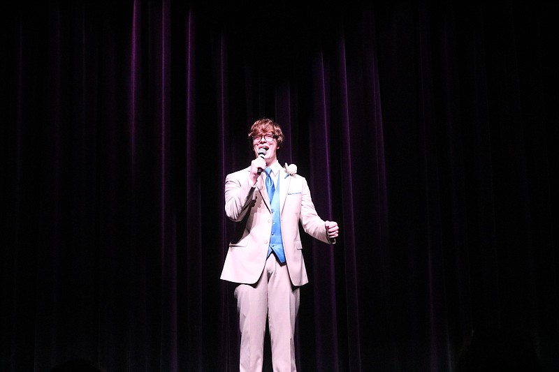 Runner-up Ryan Mulraney sings for his talent.  